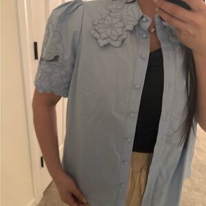 Light Blue Button-Up Blouse with Floral Details Appliqué